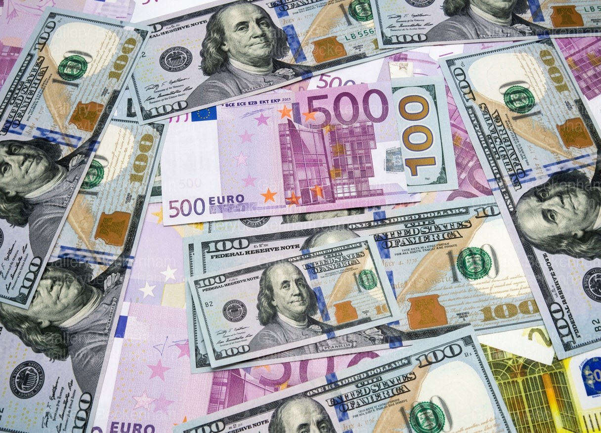 Dollar Euro Scattered Notes: licensed stock photo by Gallery Beckenham